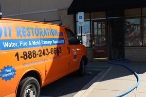 Water Damage Restoration Van Running Suction At Job Location